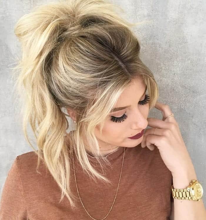  messy ponytail with middle part bangs