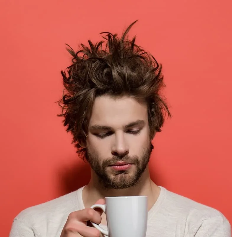 messy thick hairstyle for men