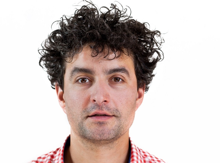 messy tight perm for men