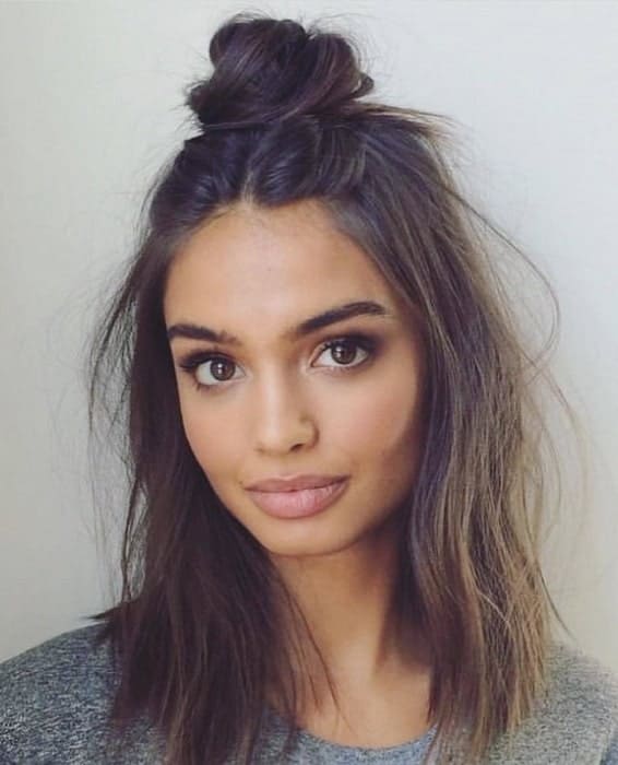 half up messy top knot