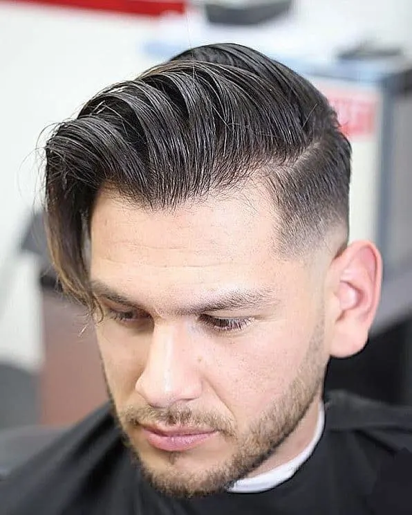 mid fade comb over style for long hair