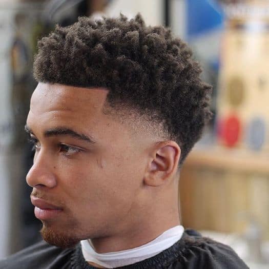 mid taper fade with afro