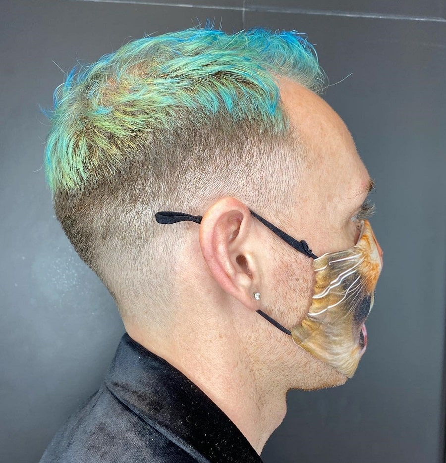 mid taper fade with blue hair