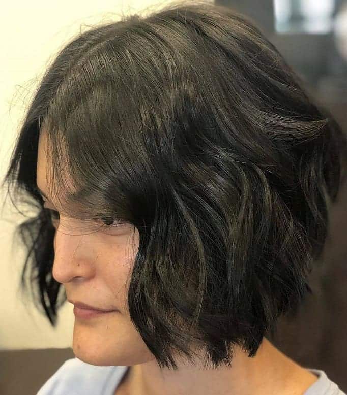 middle part angled bob for wavy hair