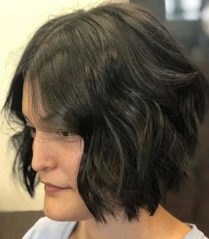 middle part angled bob for wavy hair
