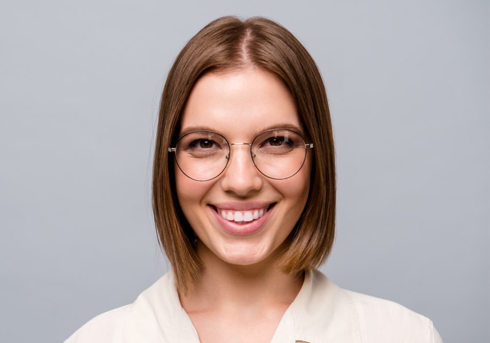 middle parted bob for oval face with glasses