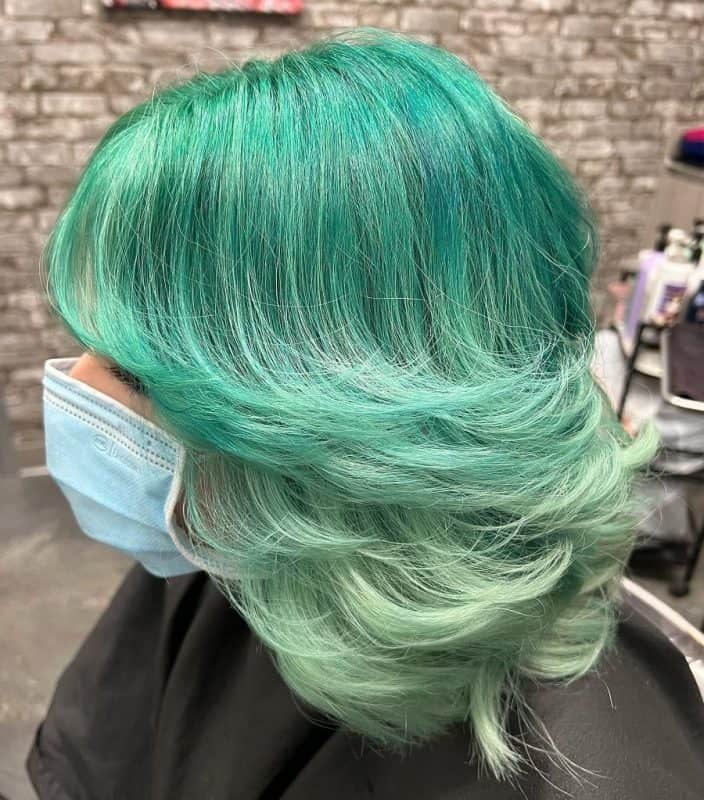 mint green feathered hair