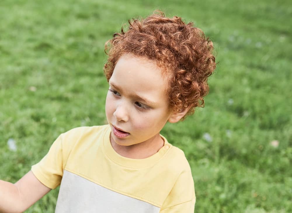 mixed boy with red hair