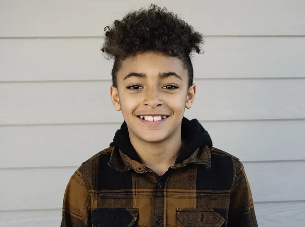 mixed boy's high top haircut