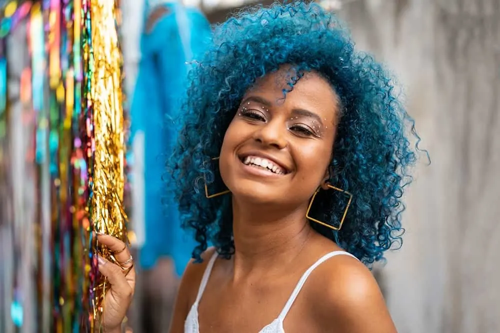 mixed girl with blue curls