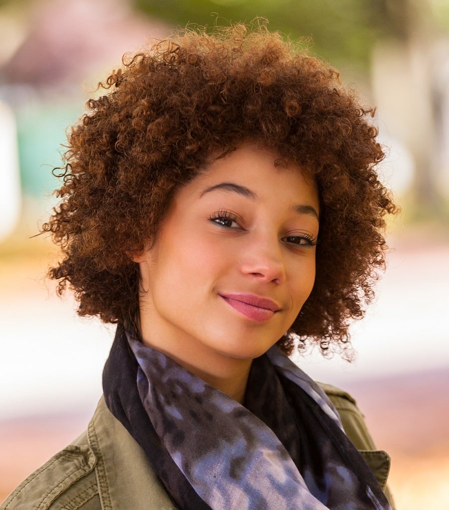 mixed girl with curly brown hair