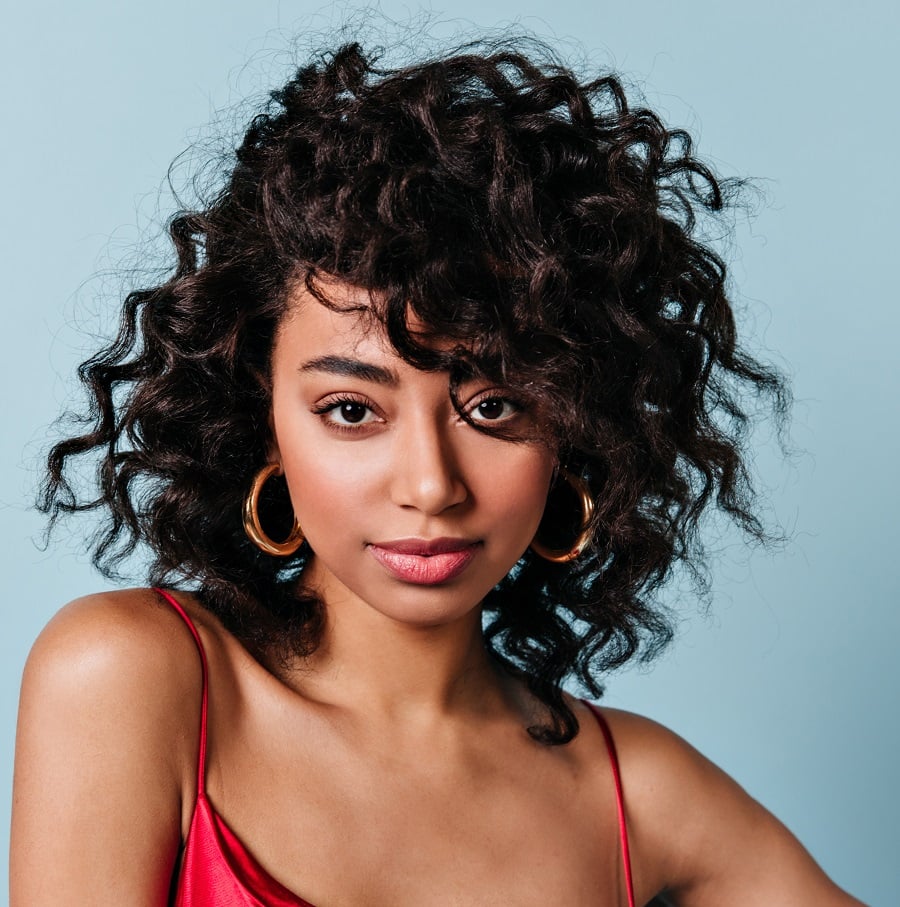 mixed girl with side swept curls