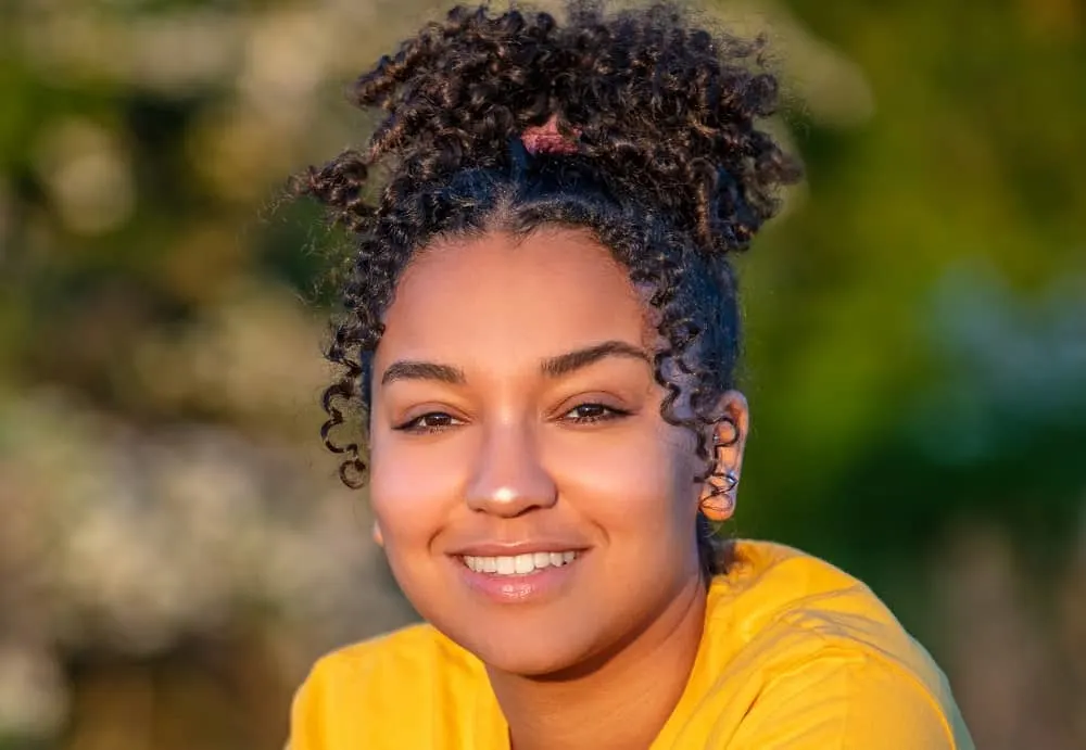 mixed girl's curly ponytail