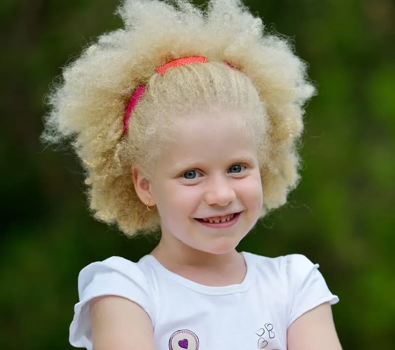 mixed little girl with curly hair