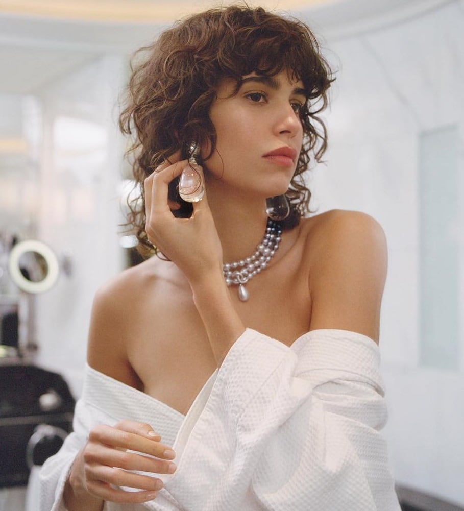 model with curly hair - Mica Arganaraz