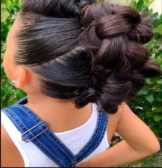 Knotted bun mohawk for a little girl