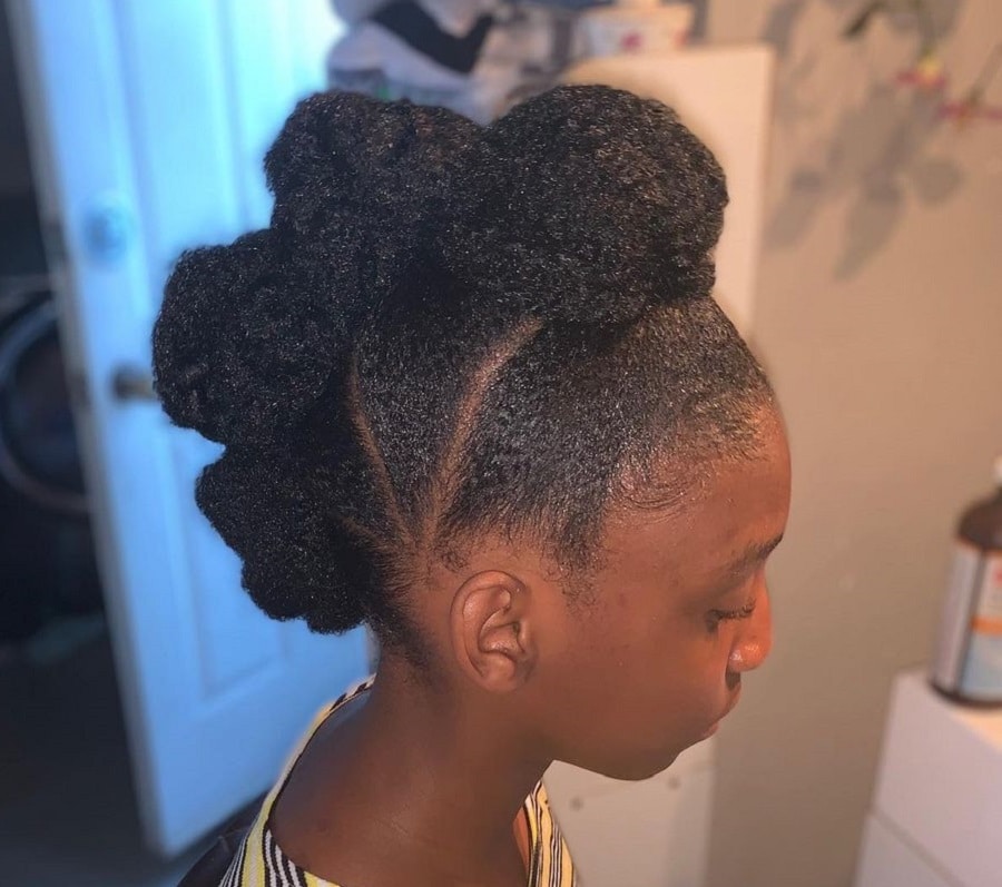 half up afro puff hairstyle