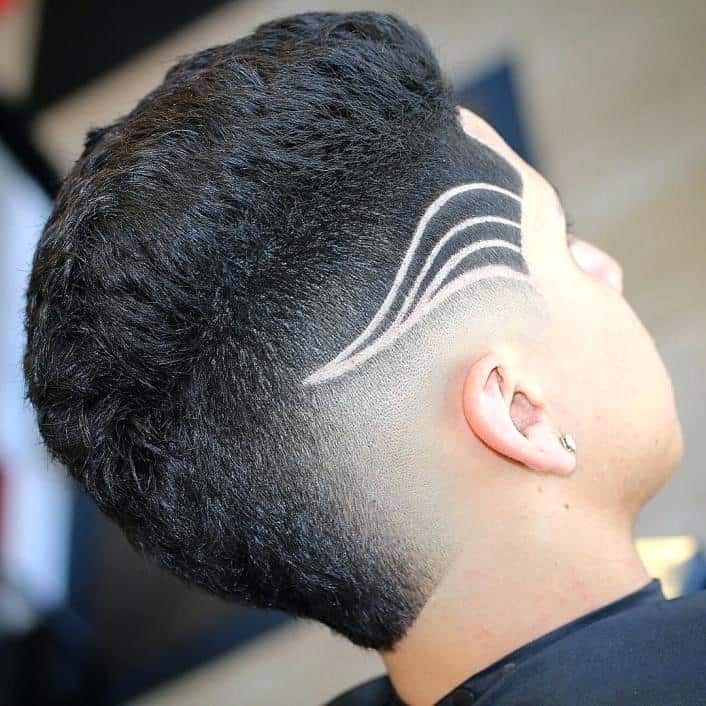 mohawk design with low skin fade