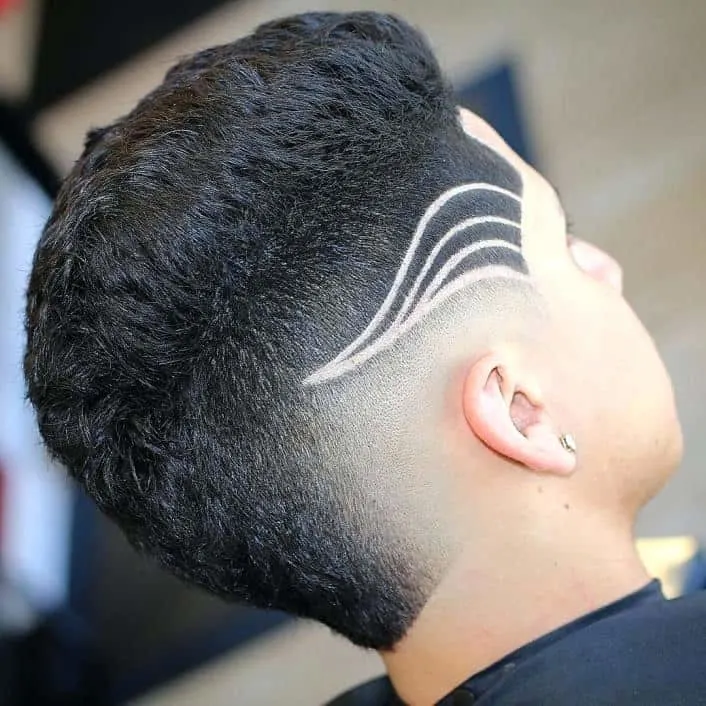 mohawk design with low skin fade