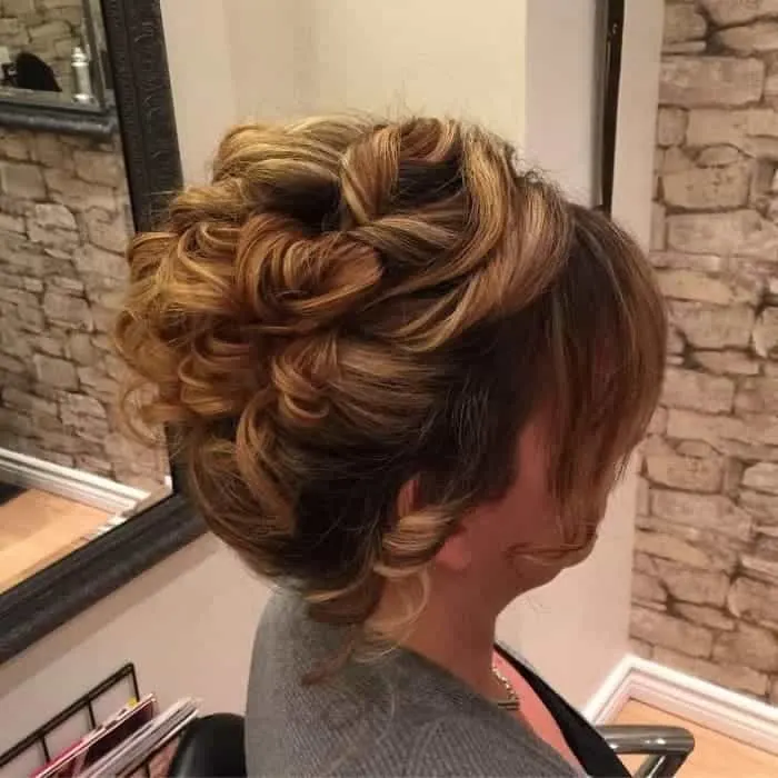 voluminous hairdo for mother of the bride