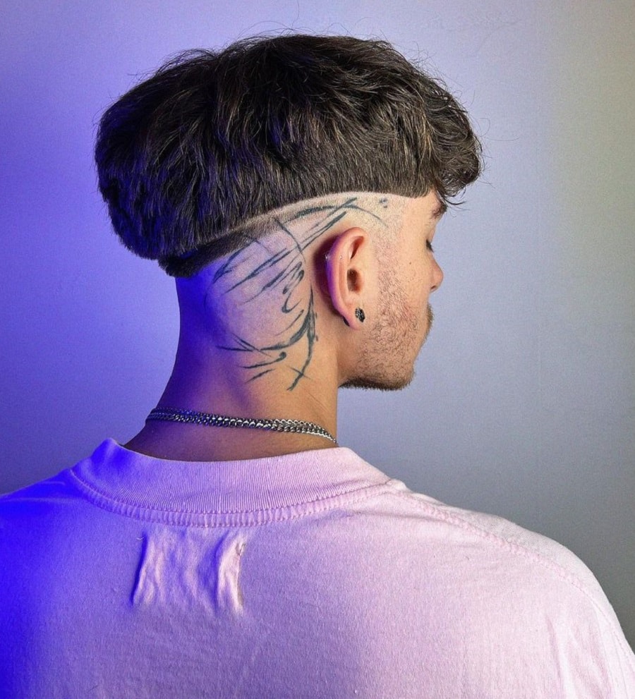 mushroom haircut with razored line for men