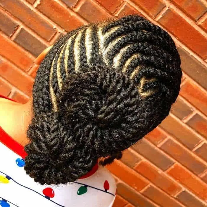 cornrow braided updo with natural hair