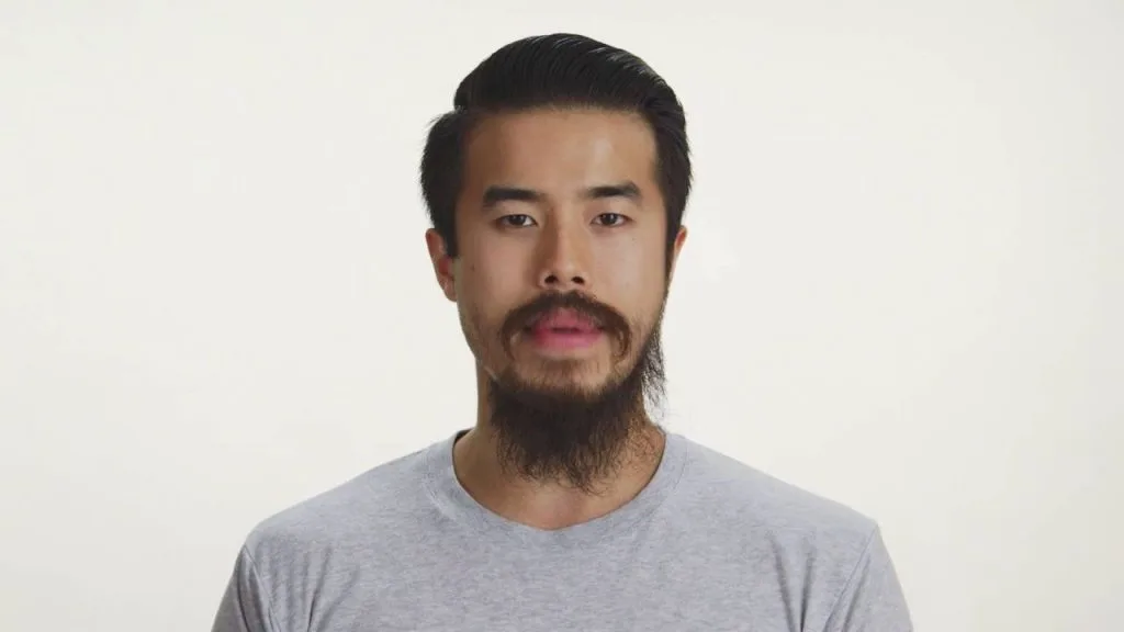 Asymmetrical Asian beard style for men