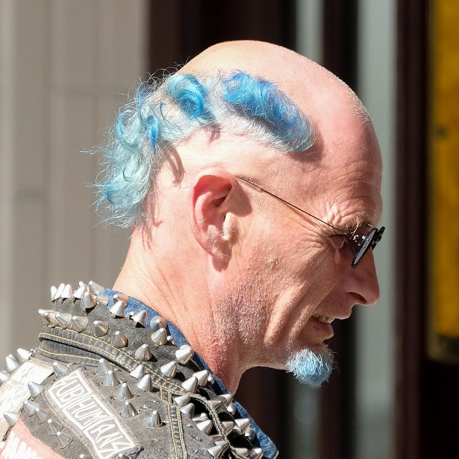 old man with blue hair with glasses