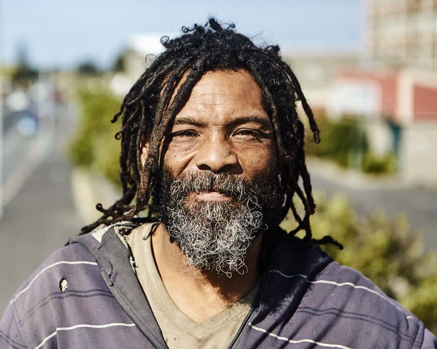 older man with long dreads