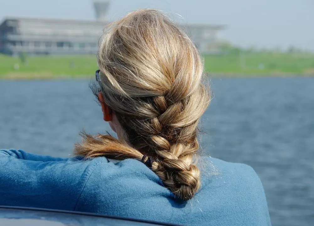 older woman with long braid