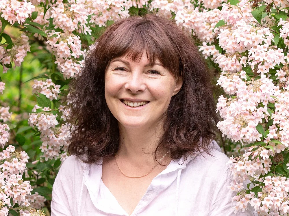 older woman with medium brunette hair