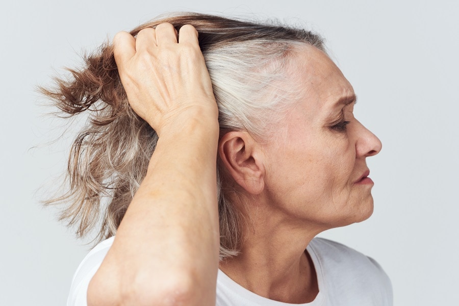 older woman with slow hair growth