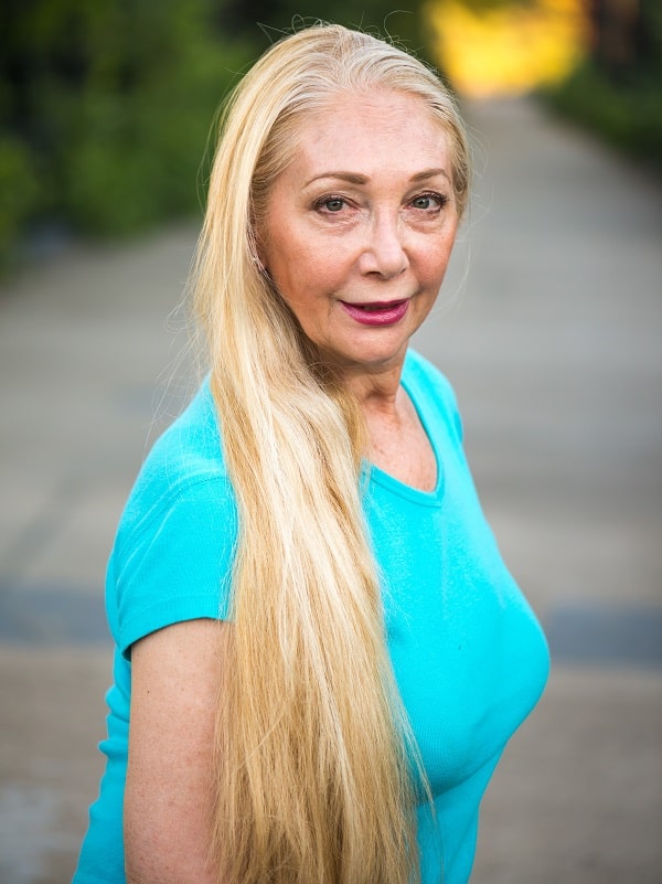 older woman with very long hair