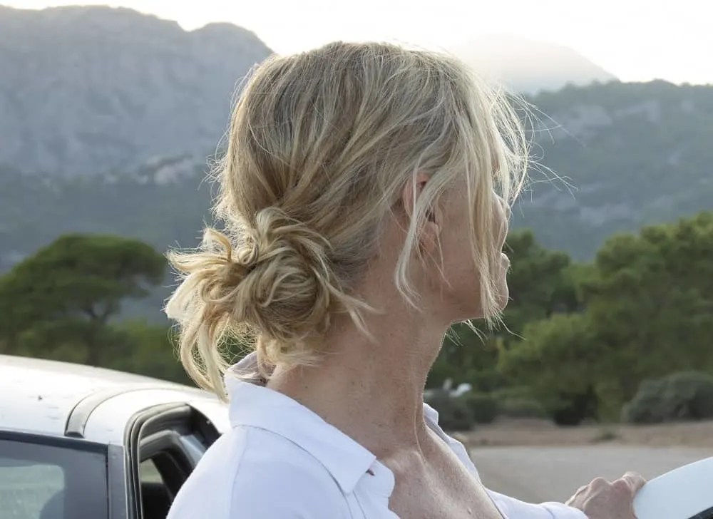 over 50 woman with messy bun