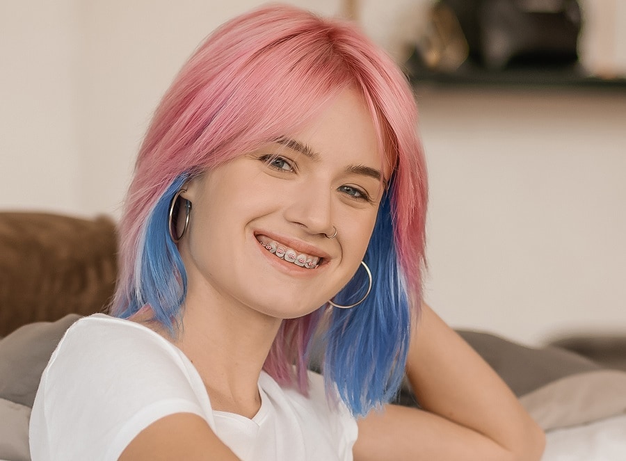 Pastel pink hair with blue underneath