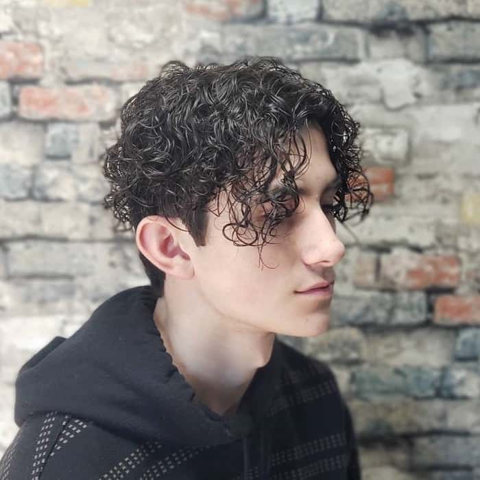 middle parted perm hair for men