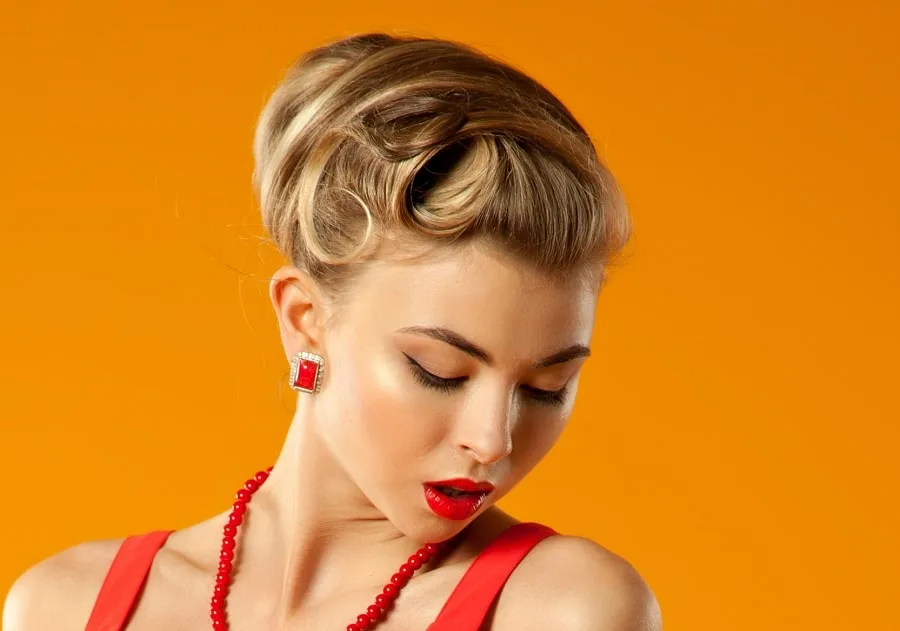pin up hairstyle with medium hair for heart face