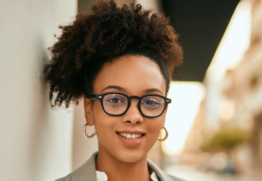 Natural pineapple hairstyle for black women with glasses