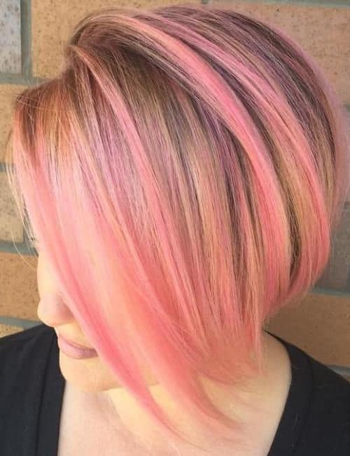 dark blonde bob with pink highlights