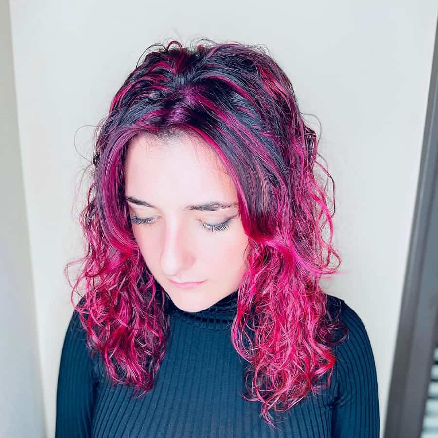 pink highlights on curly hair