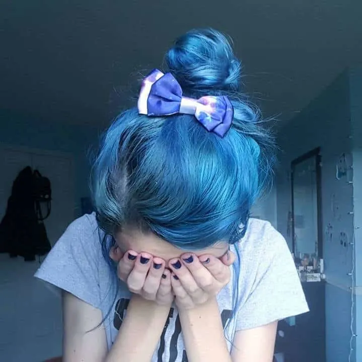 messy top knot with blue hair