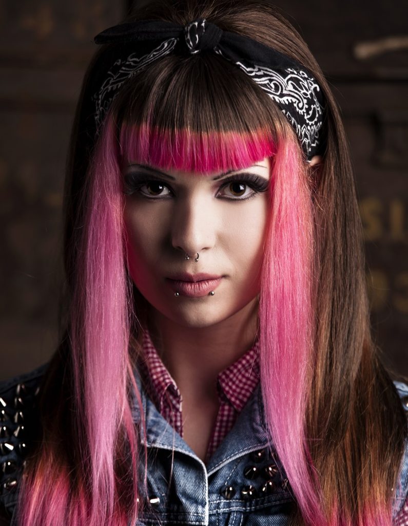 25 Bold Skunk Stripe Hairstyles That Are Trendy In 2024   Pink Skunk Stripe Hairstyle With Bangs 795x1024 