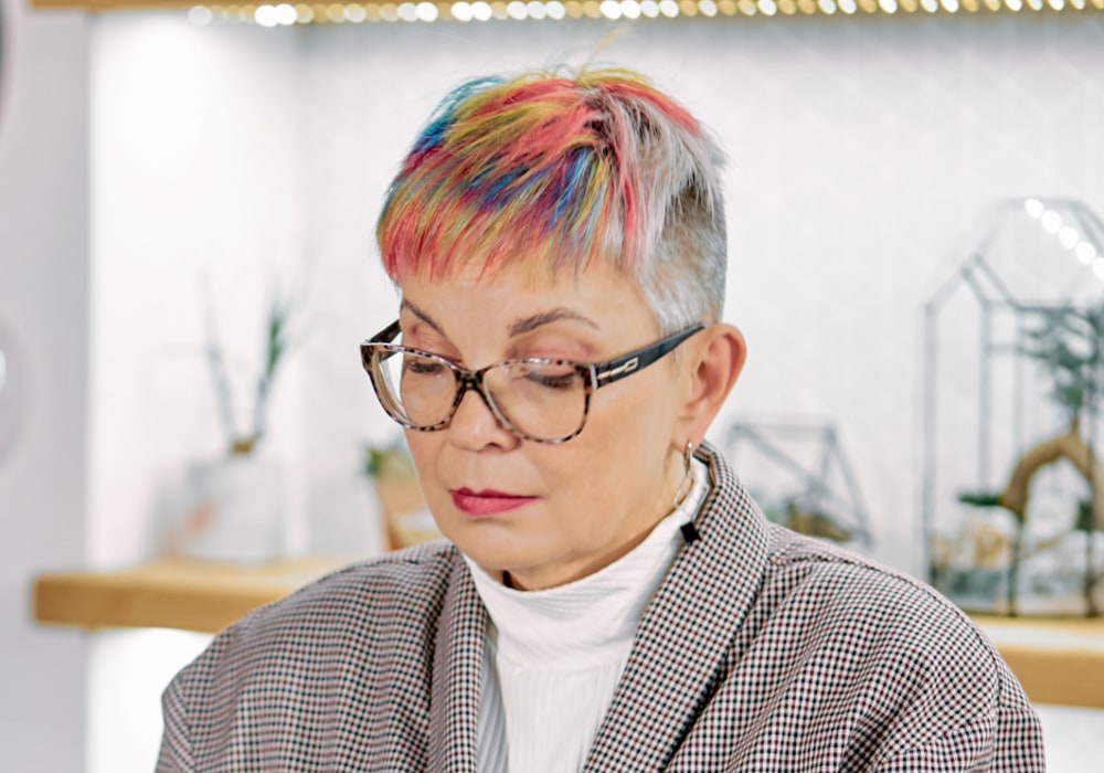 pixie cut with highlights for older ladies with glasses