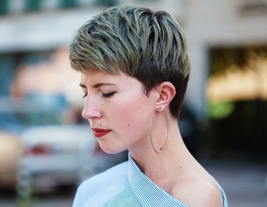 pixie haircut with green highlights