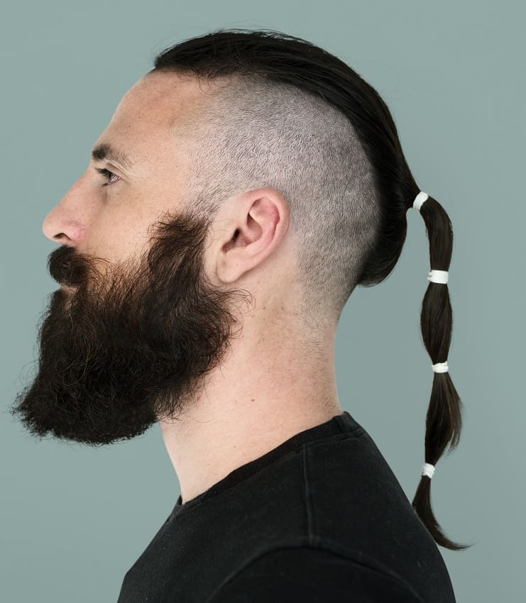ponytail and full beard