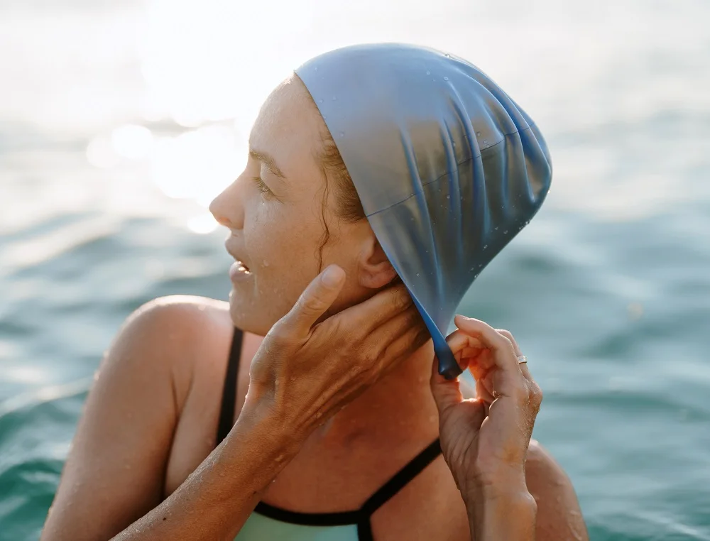 protecting bleached hair from chlorine damage - wear swimming cap