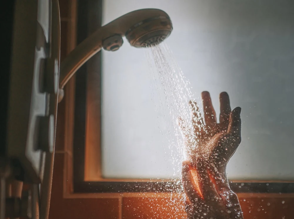 protecting bleached hair from hard water damage - shower filter