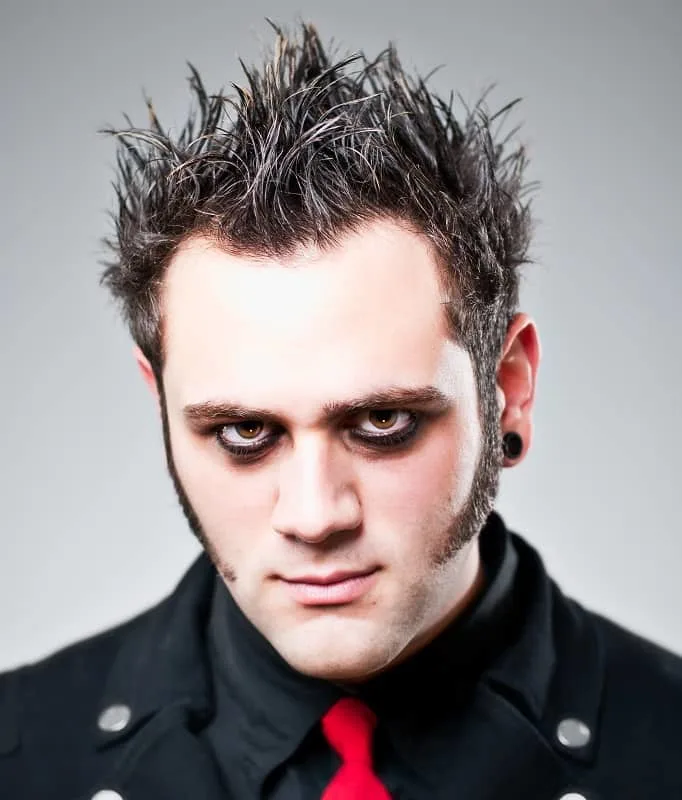 punk guy with sideburn hair