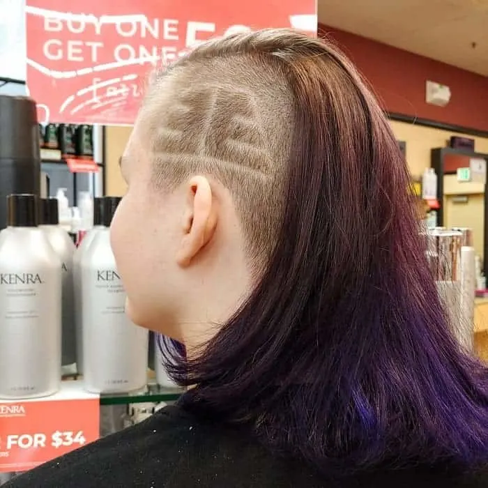 brown haircut with purple highlights