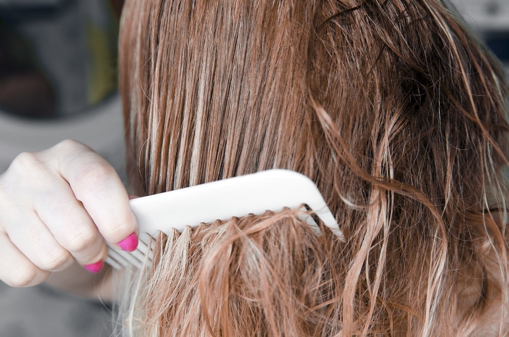reasons why hair is too thick at the bottom - Brushing and Combing Incorrectly